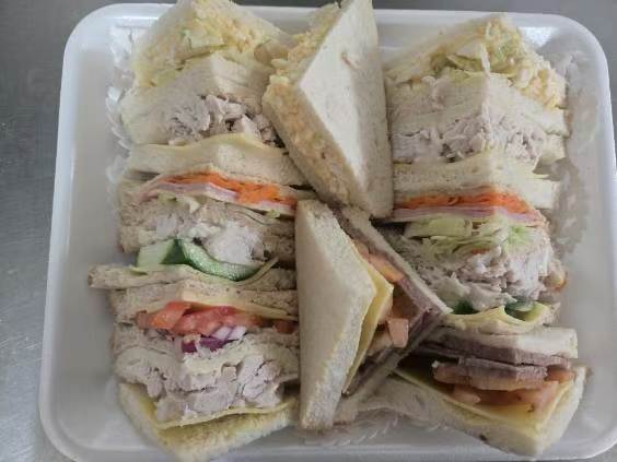 A platter of assorted sandwiches